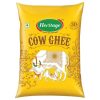 Pure cow ghee in ceramic bowl steel